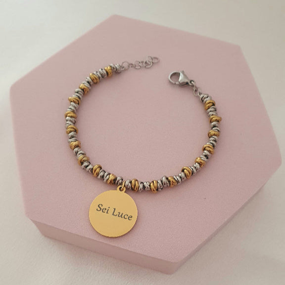 Bracciale nodini bicolore medaglia oro