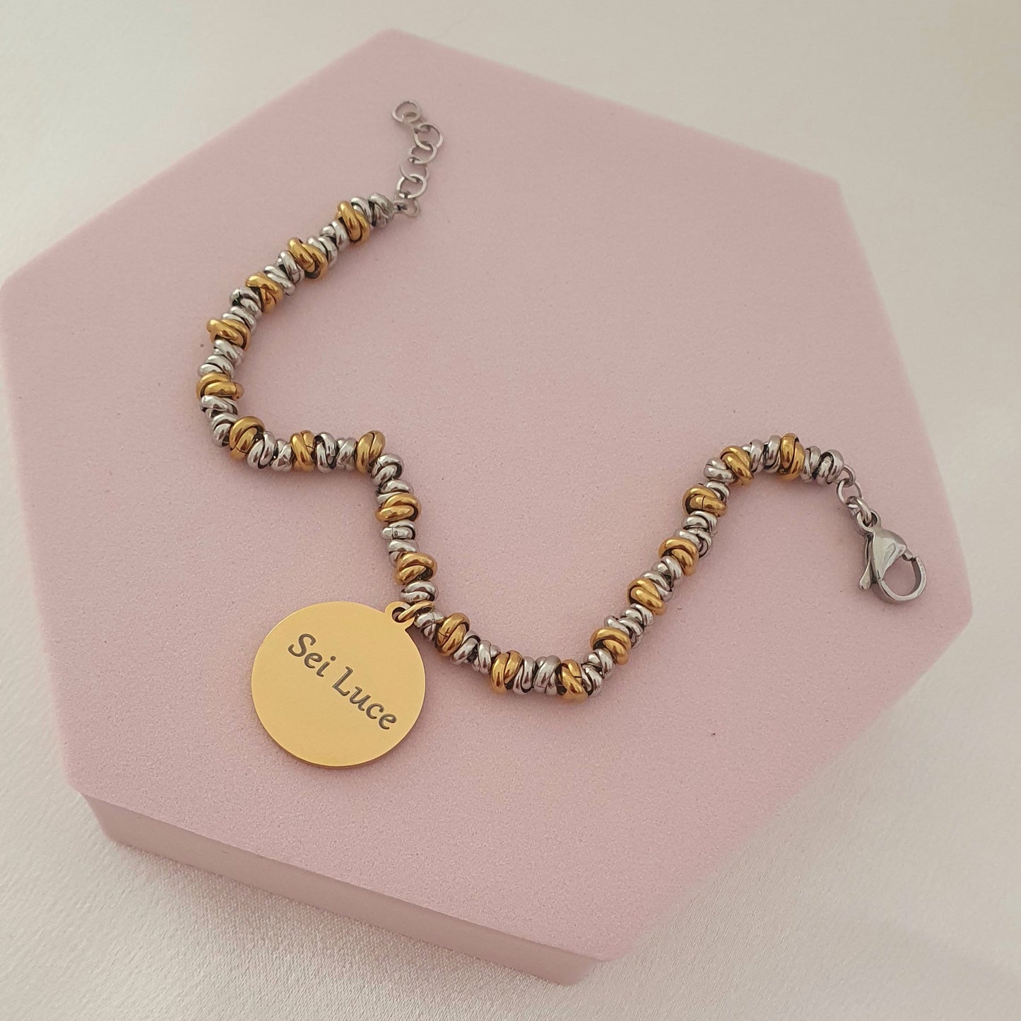 Bracciale nodini bicolore medaglia oro