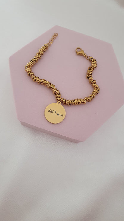 Bracciale nodini medaglia oro
