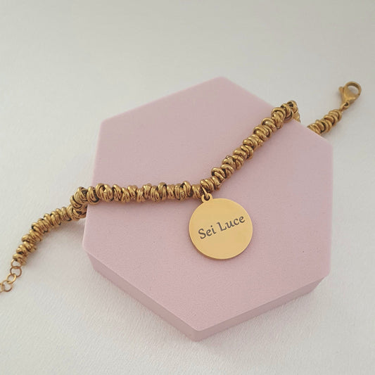 Bracciale nodini medaglia oro