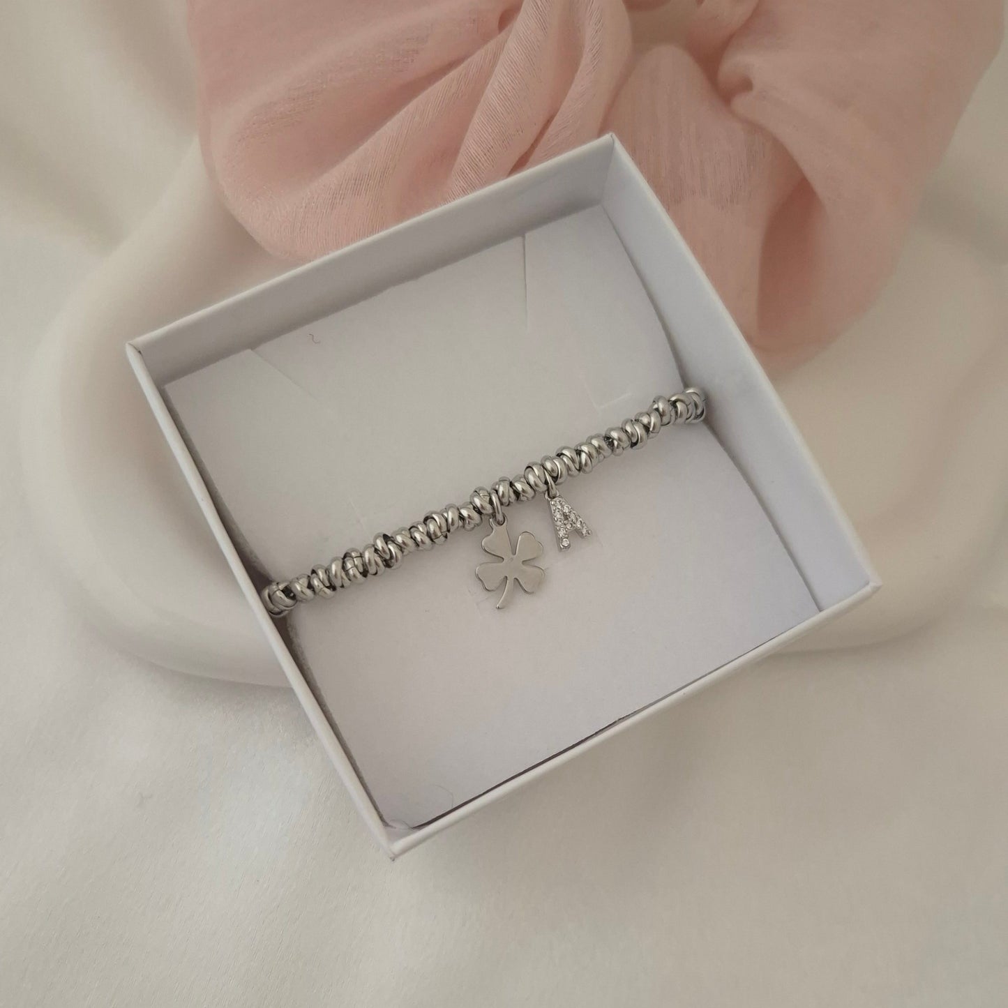 Bracciale rondelline con inziale