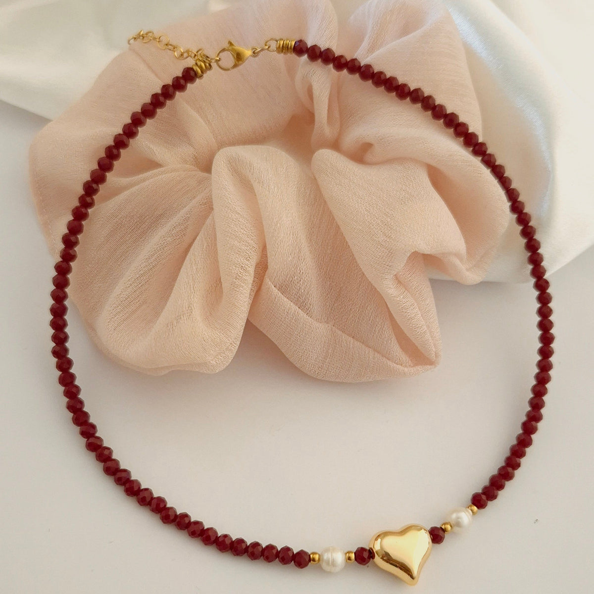 Collana cuore bombato bordeaux